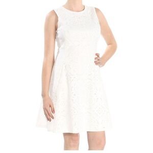 ESTABLISHED ROUND NECKLINE SLEEVELESS ZIP CLOSURE ABOVE THE KNEE LENGTH DRESS